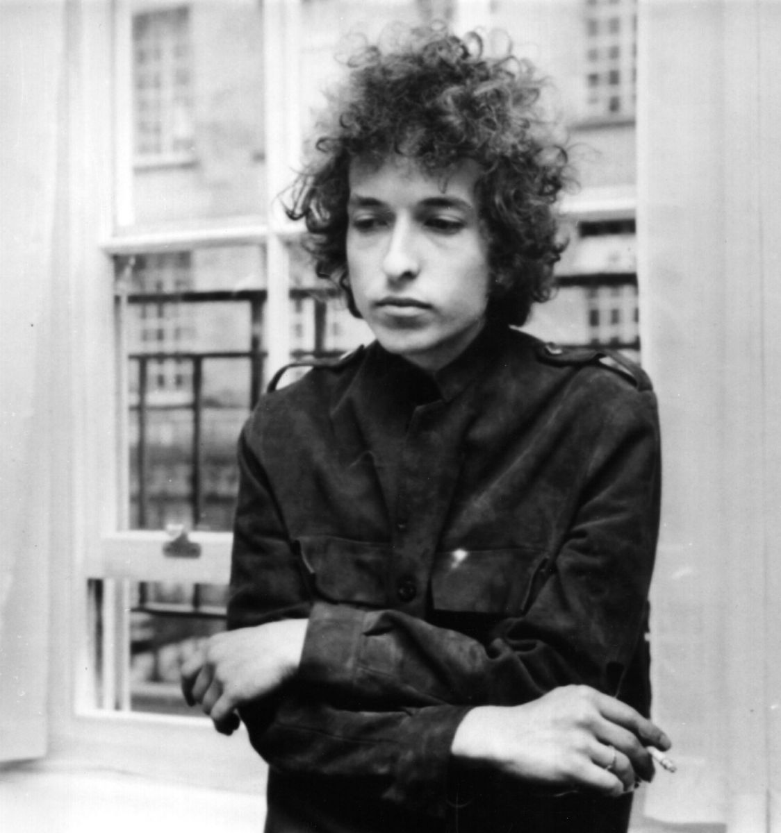 Black and white photograph of a young Bob Dylan in 1968.