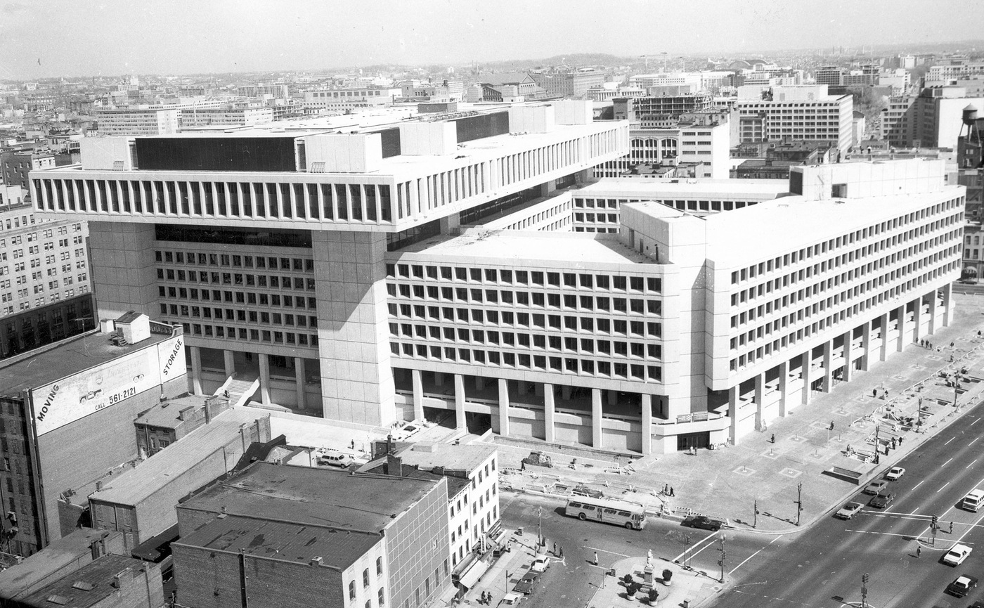 Black and white aerial photograph of the J. Edgar Hoover Building, headquarters of the FBI, in Washington, D.C.